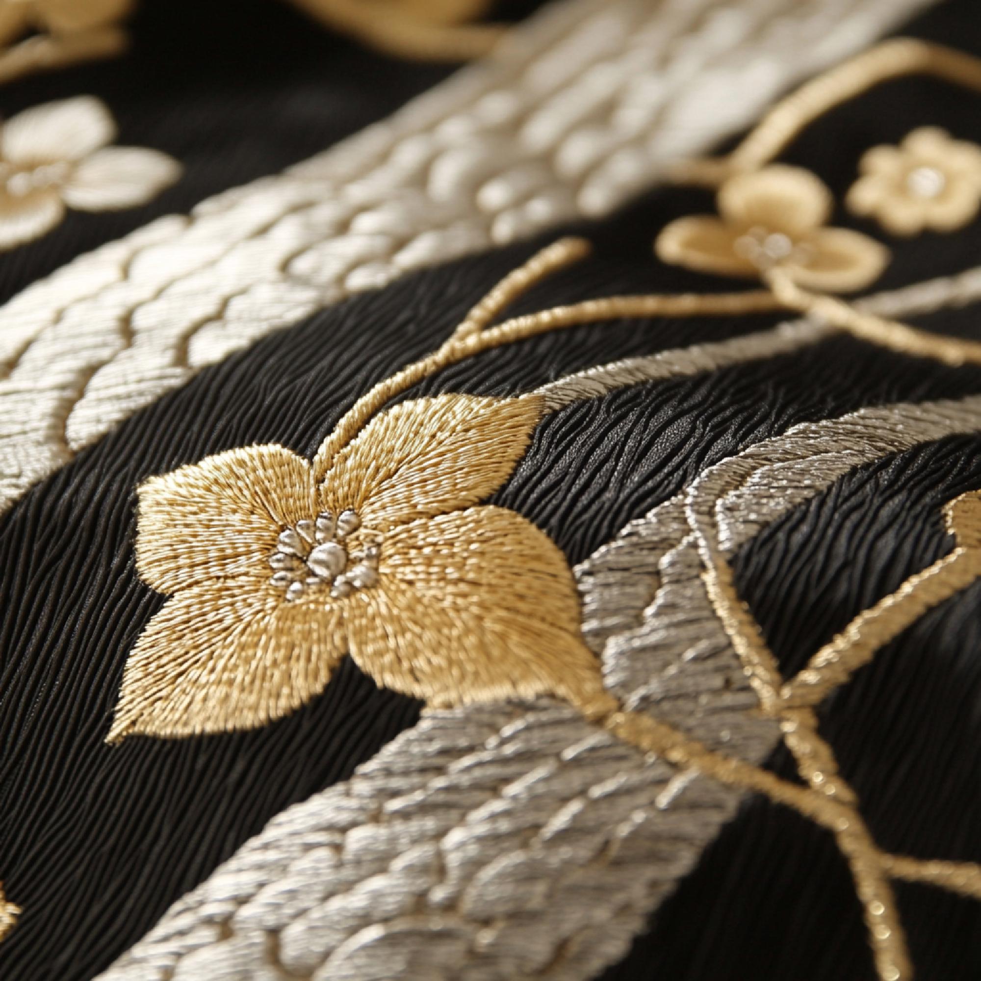 close-up of gold thread embroidery
